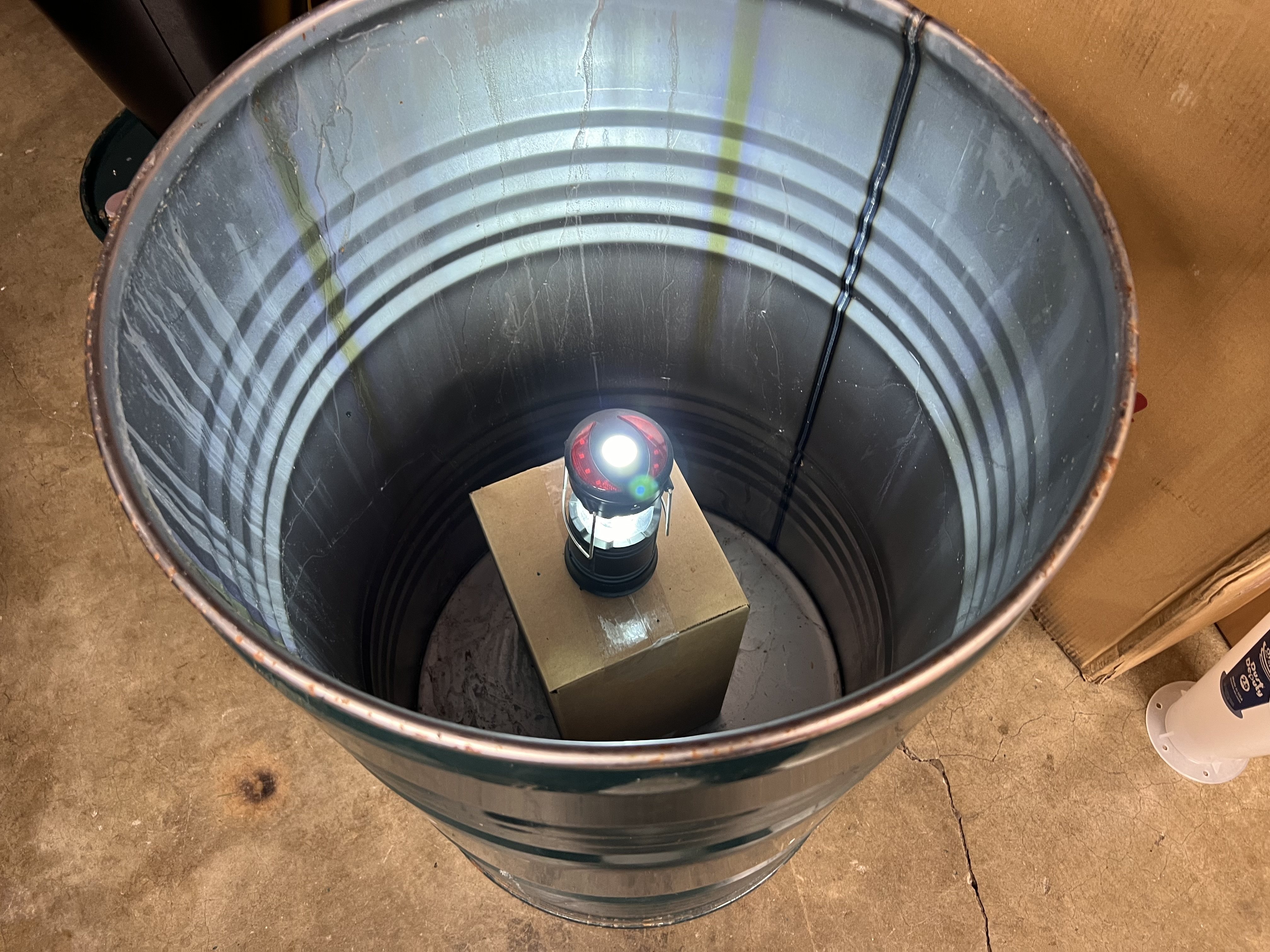 Lantern on plinth (look it up) in a drum.