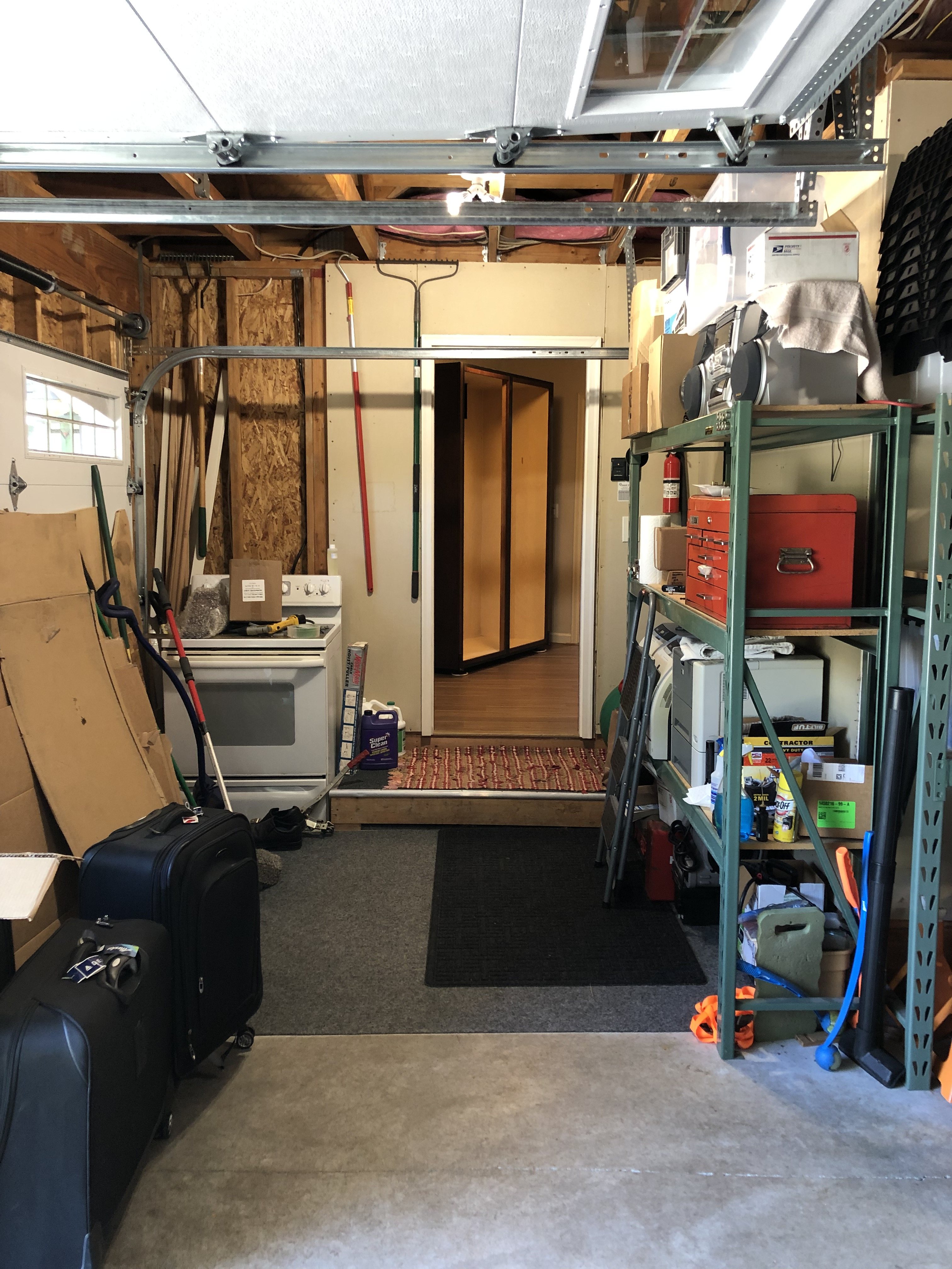 Next day, we got the cabinet moved from the garage 2nd bay into the mud room.