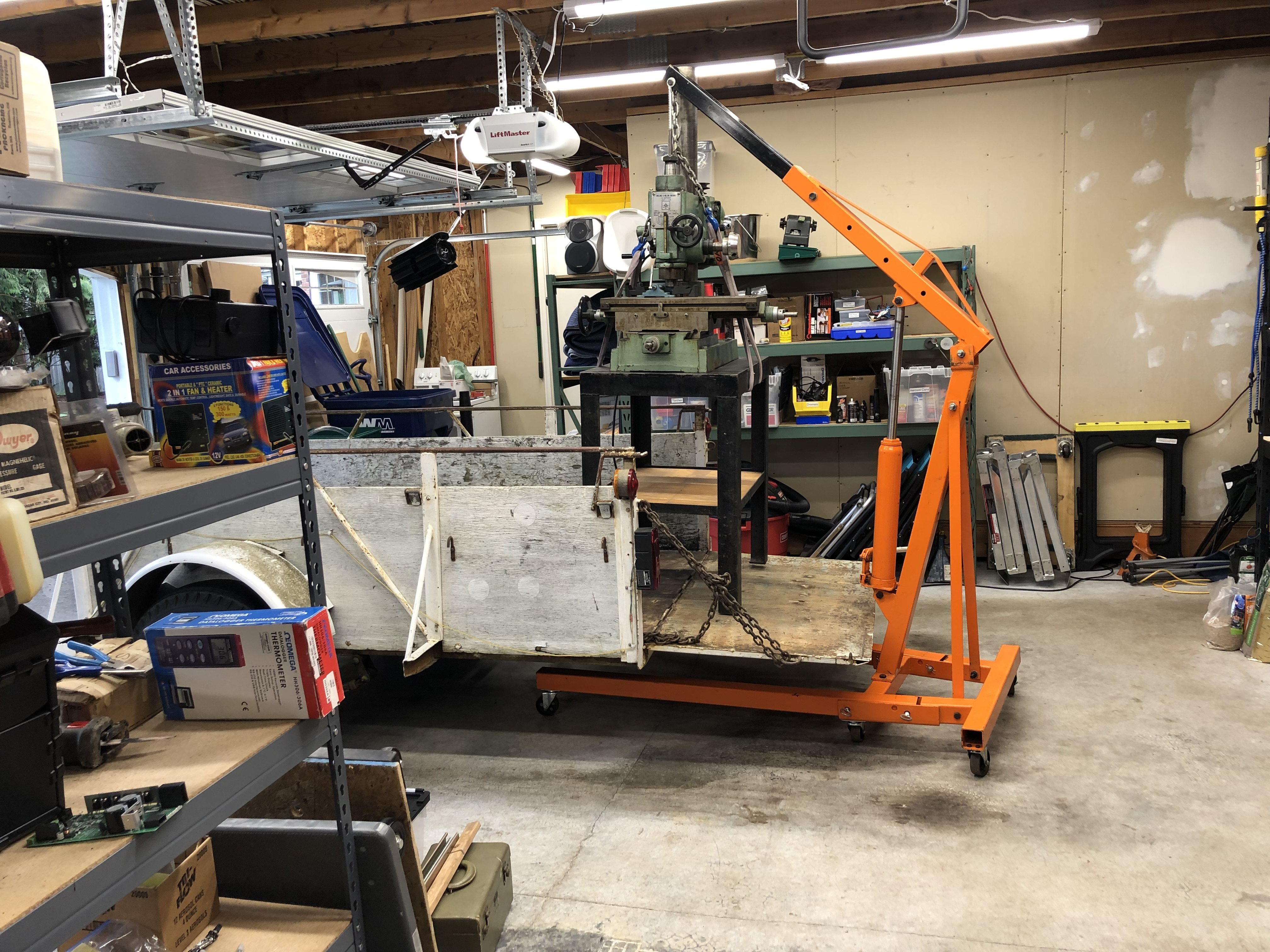 Jet-16 Mill/Drill, in garage @ Duvall, Wash. Trial lift, to see if the hoist could lift high enough to get it onto the trailer.