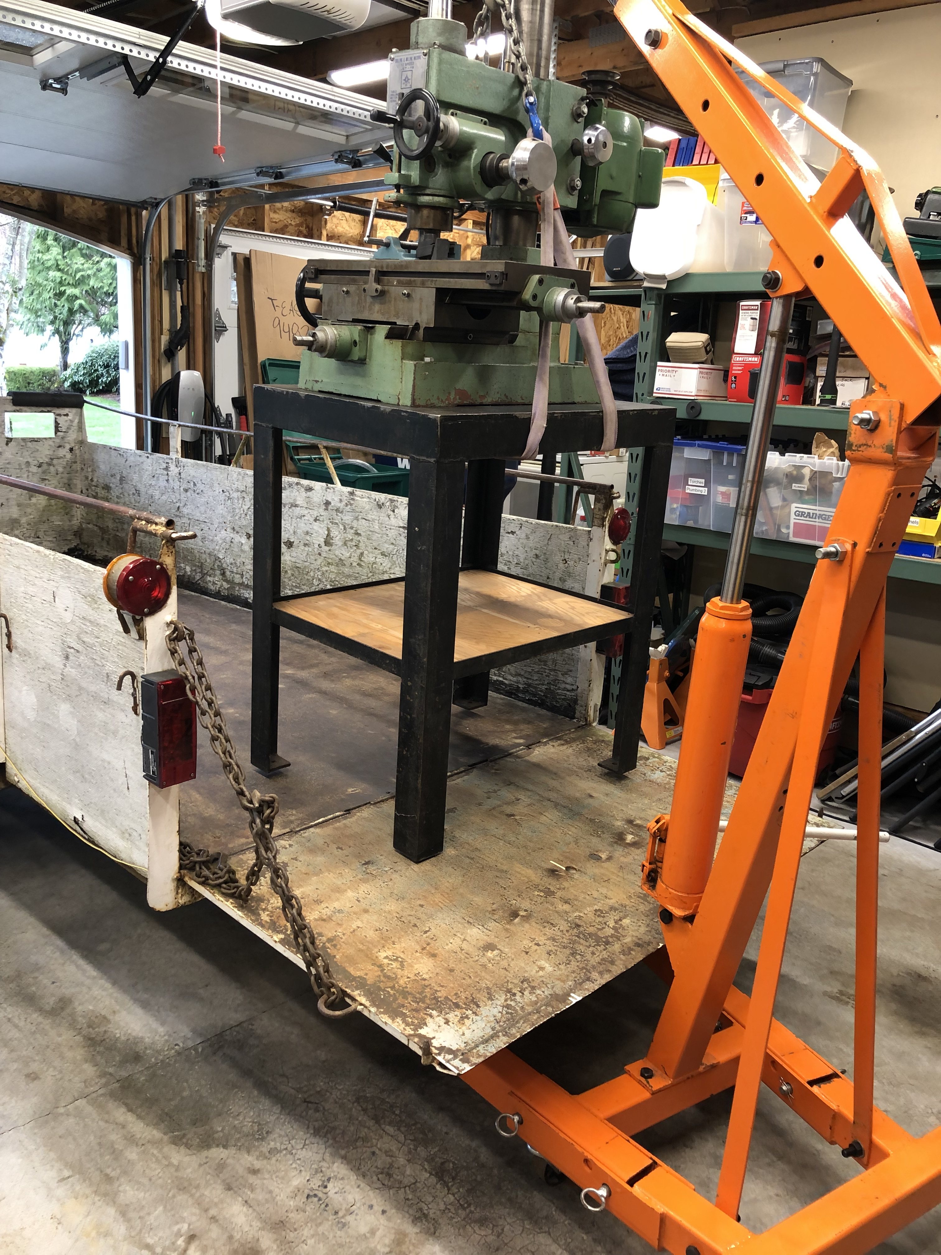Jet-16 Mill/Drill, in garage @ Duvall, Wash. Trial lift, to see if the hoist could lift high enough to get it onto the trailer.