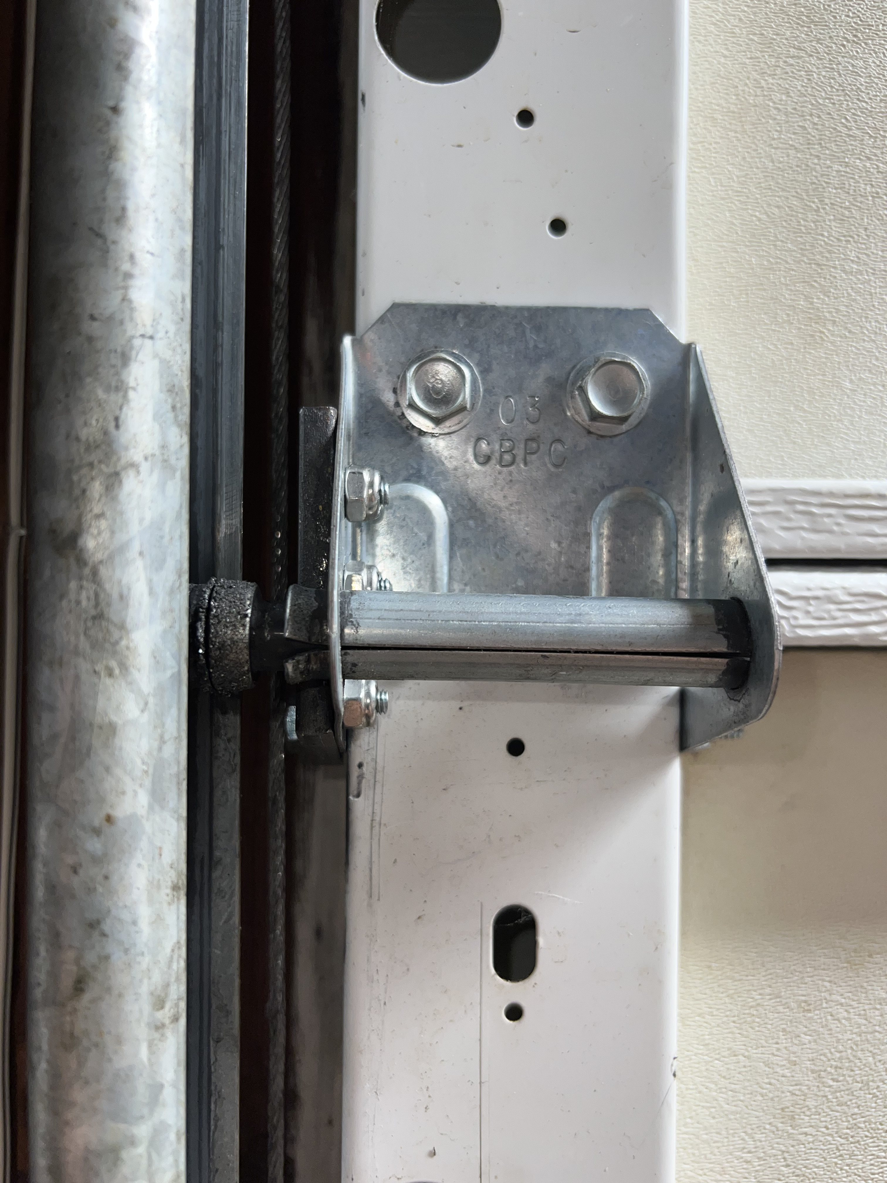 Repaired hinge mounted to door.