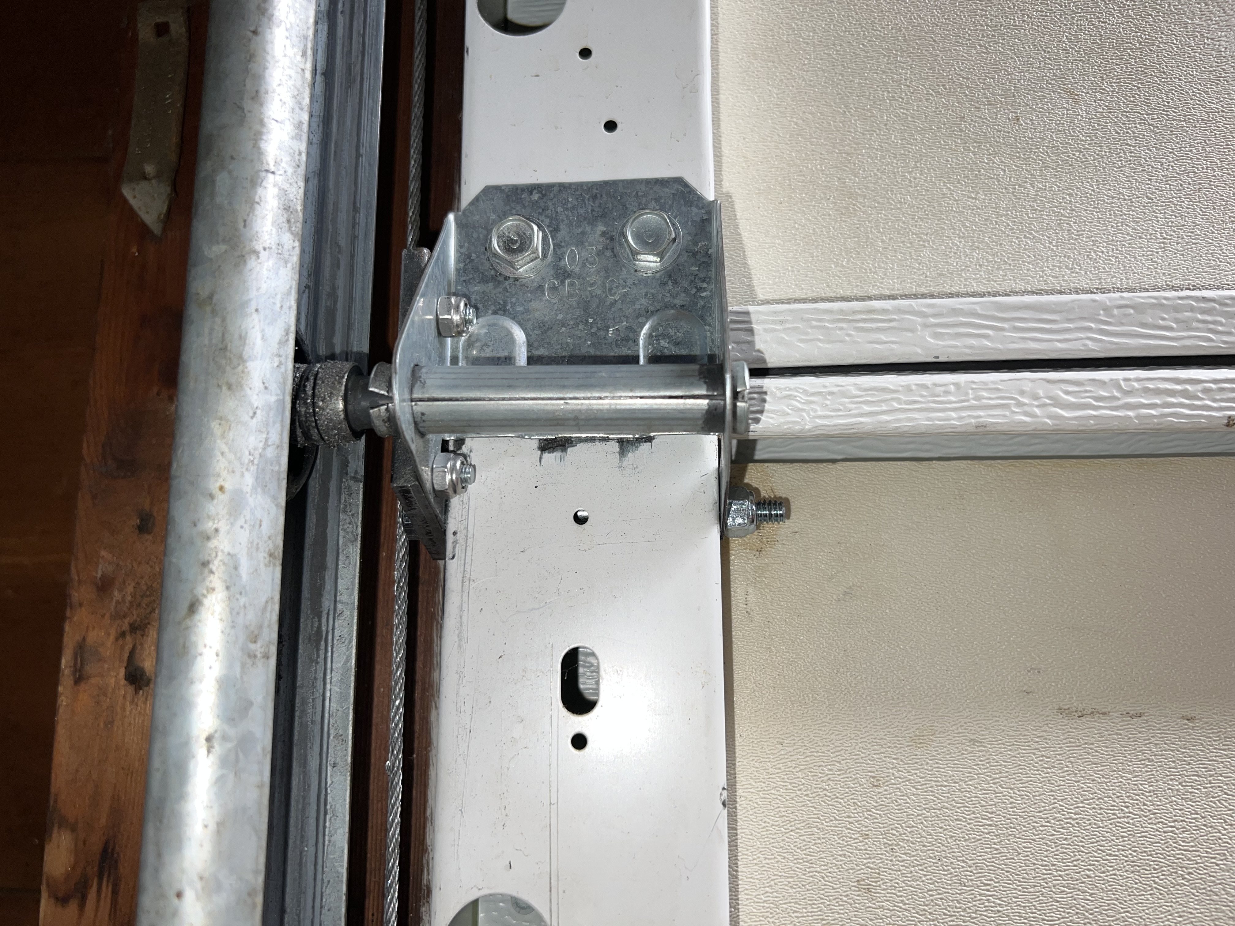Repaired hinge mounted to door.