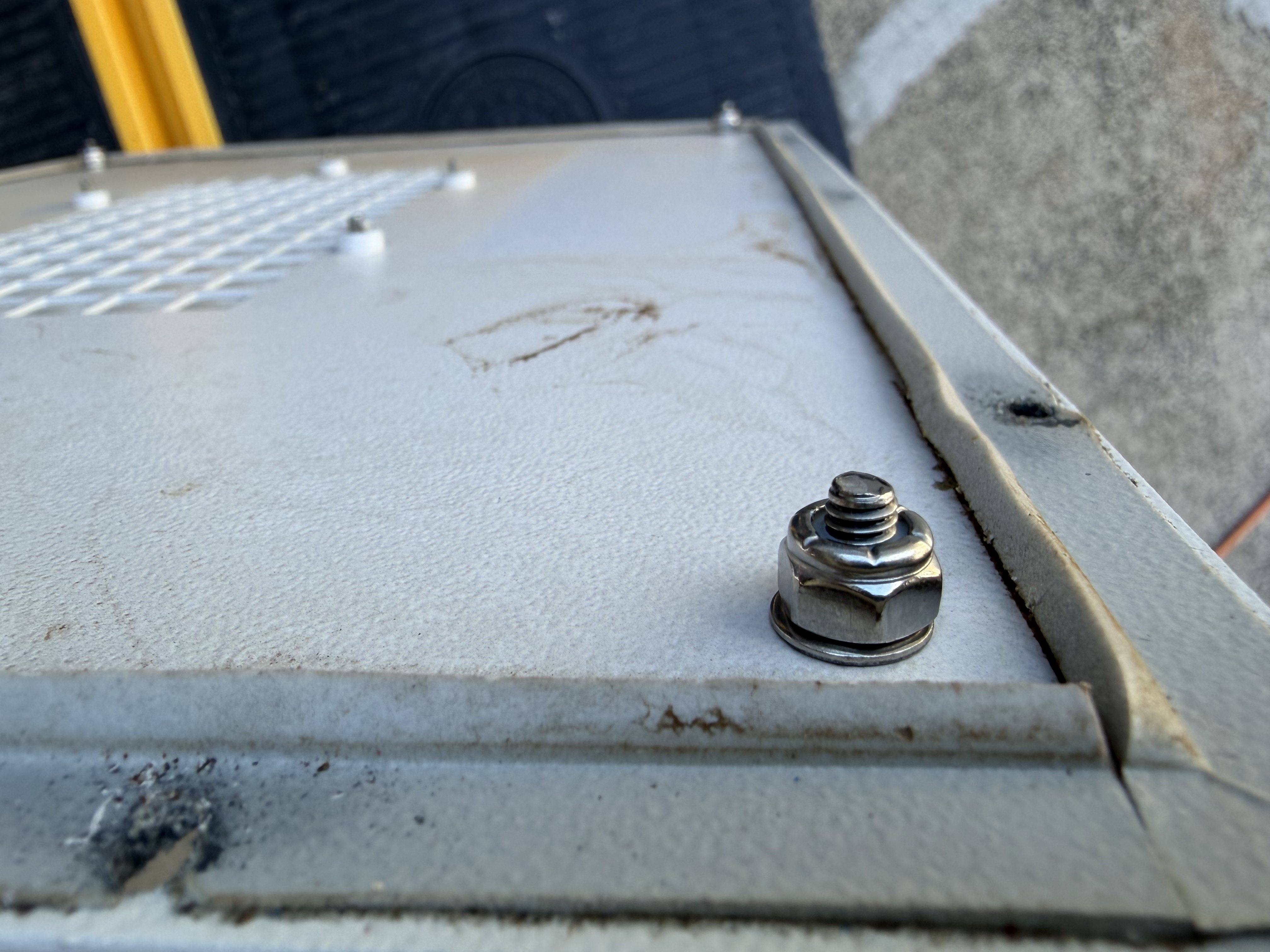 Rubber feet mounted with #8 x 5/8" screw, nylock nut