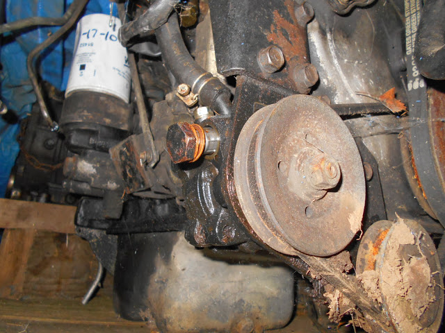 4. Power Steering pulley and the pressure hose mount location.