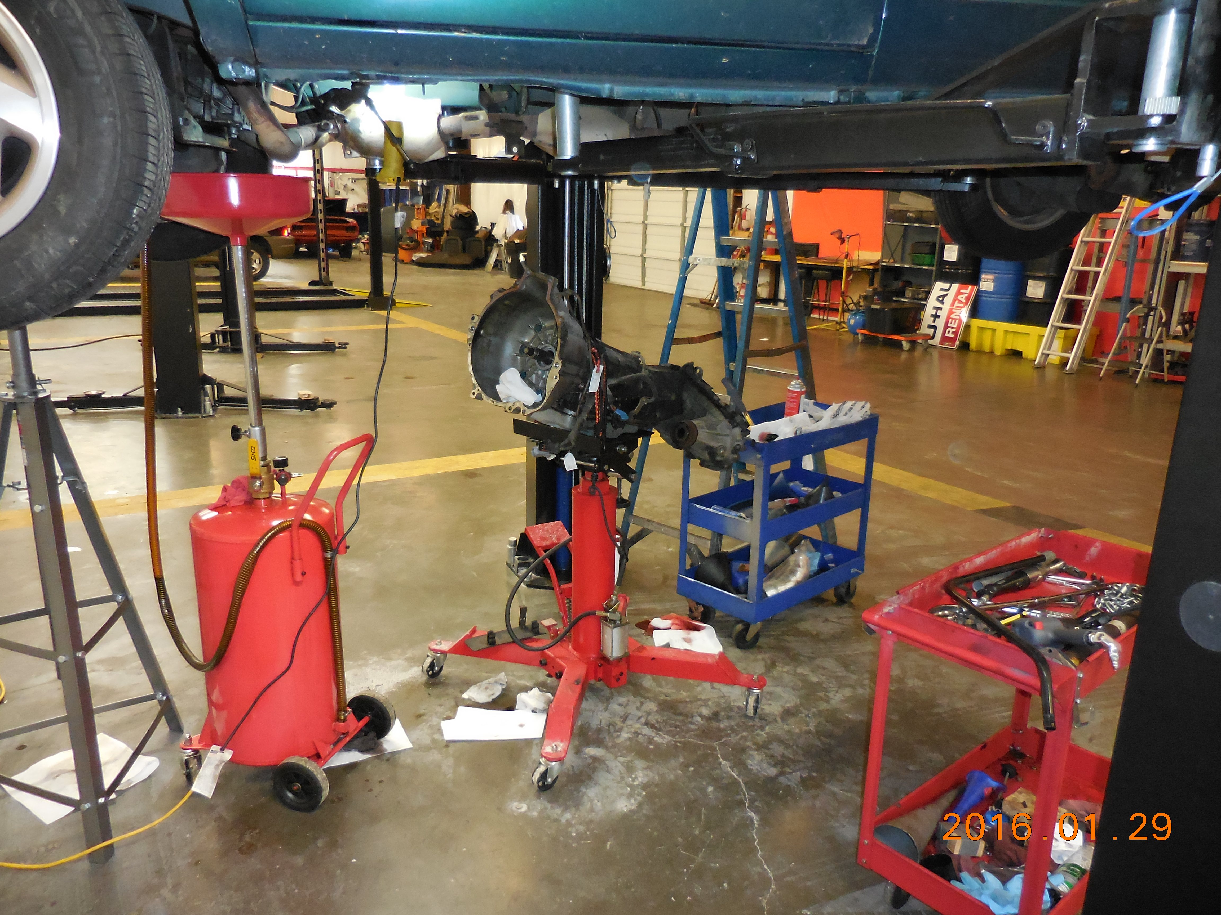 1997 Aerostar 4.0l OHV e4WD, trans & transfer case removed using rented service bay and transmission jac.