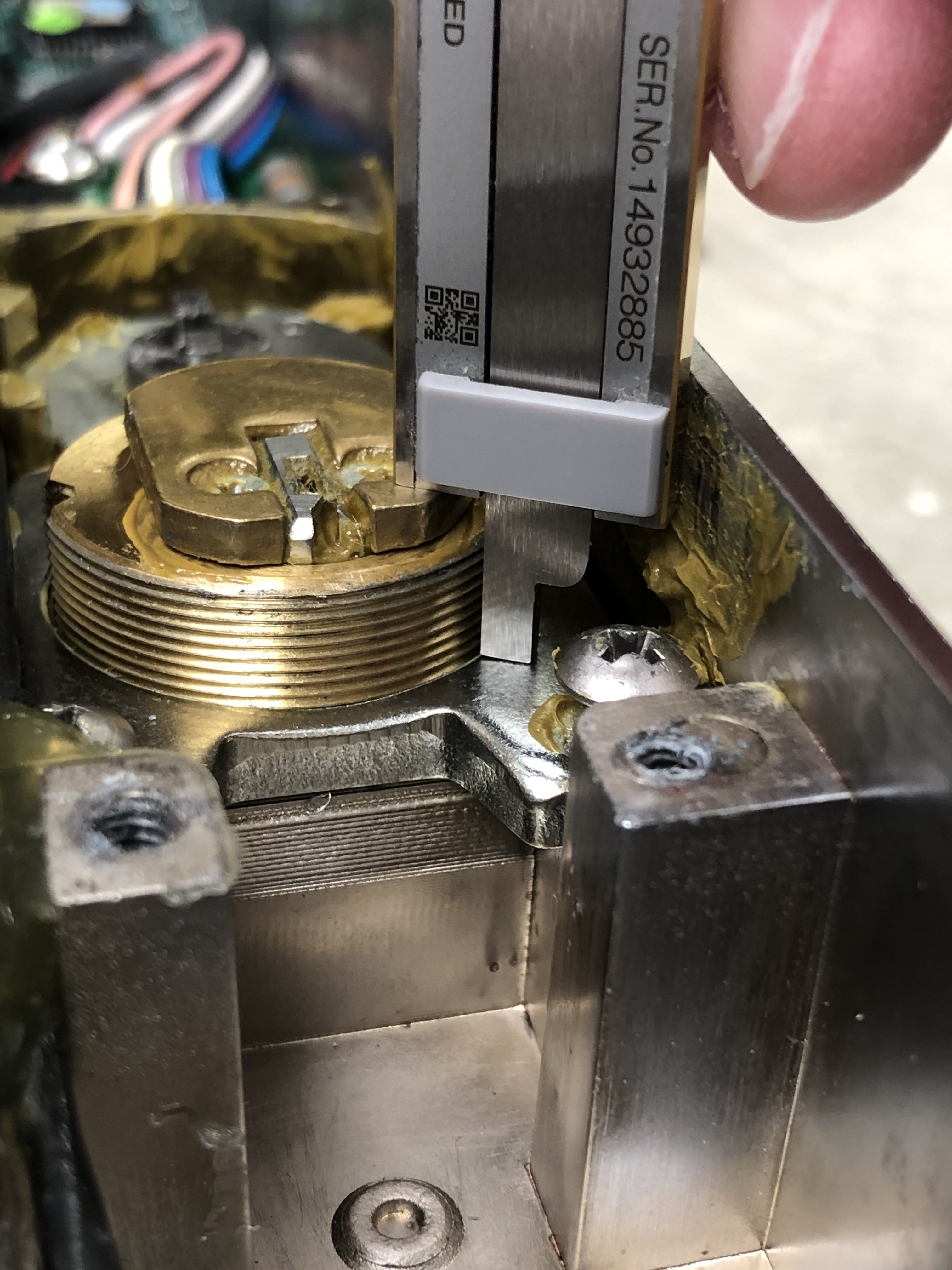 Measuring the mortise cyl. installation depth via dial caliper