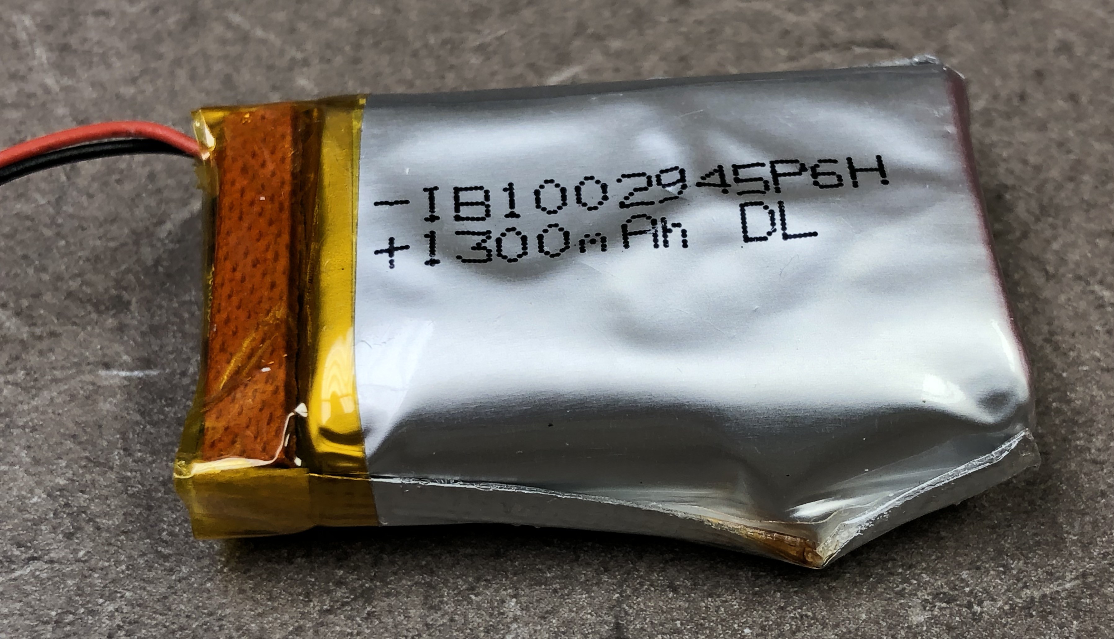 Cobra Libre: original battery, showing damage